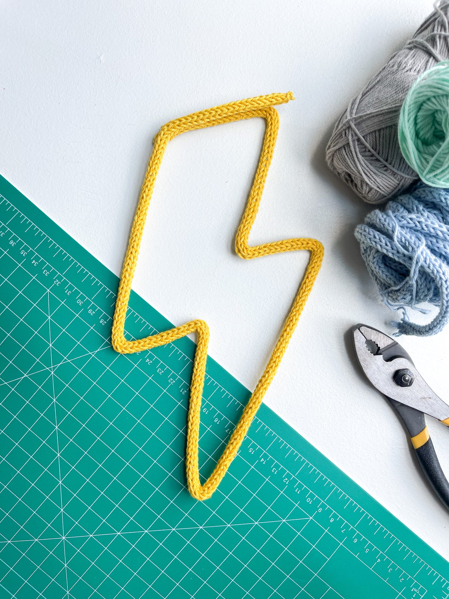 Knitted wire lightning bolt shape.