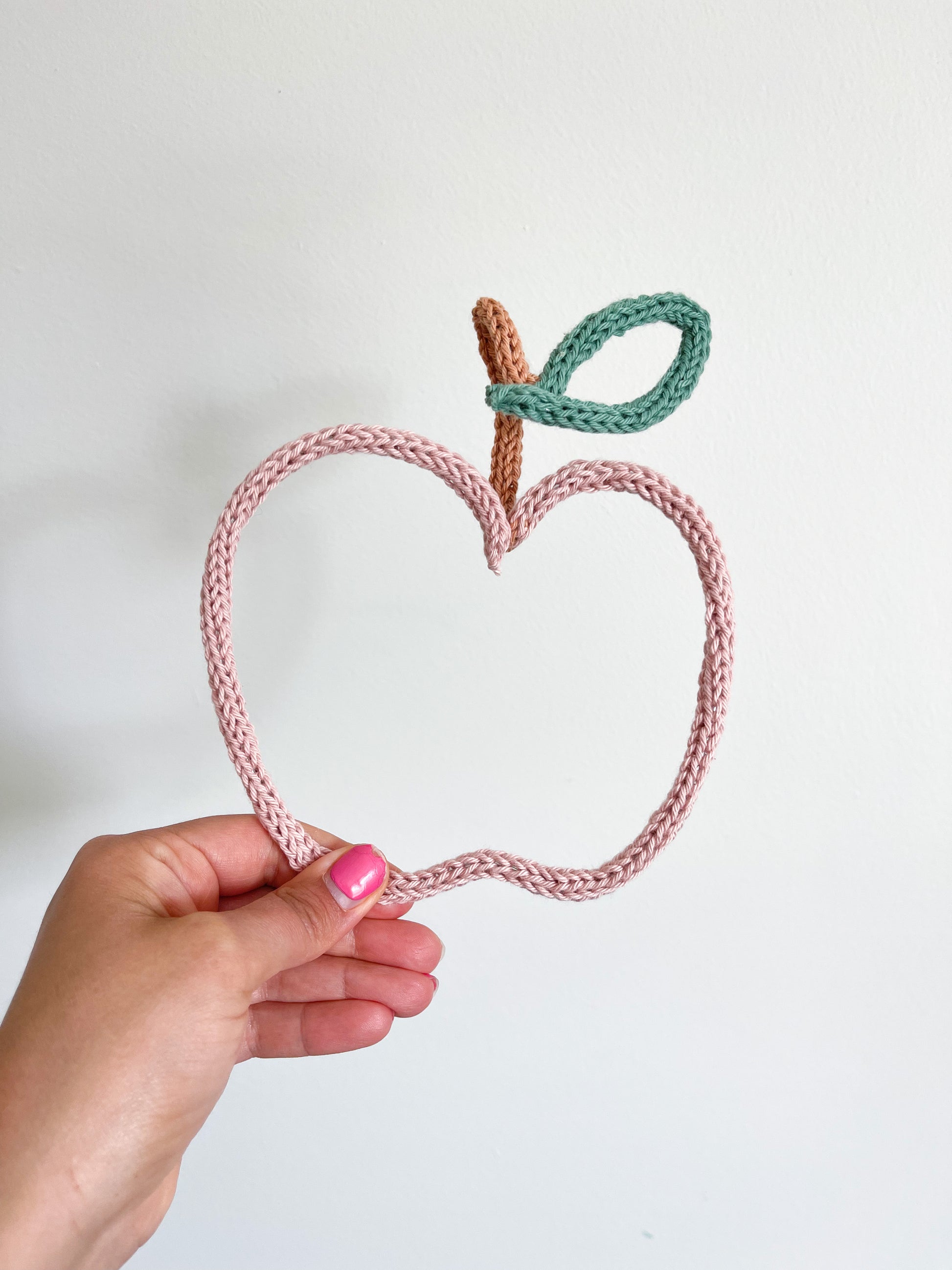 Knitted wire apple shape.