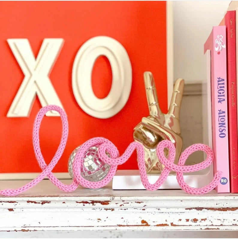 Knitted wire word "love"